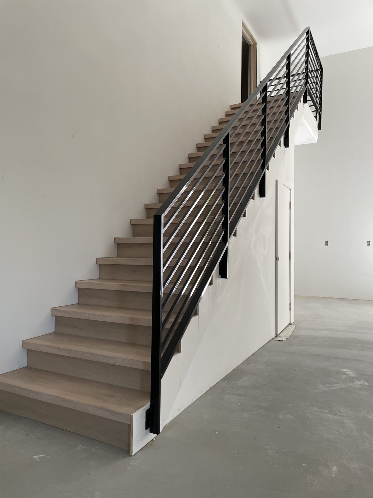 Horizontal Slat Railing Garage Outside